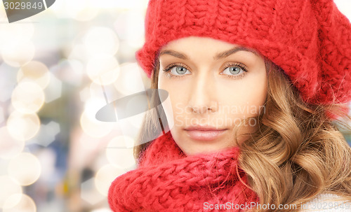 Image of close up of young woman in winter clothes