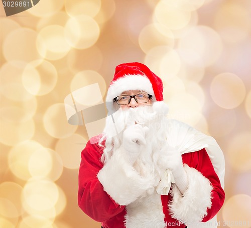 Image of man in costume of santa claus with bag