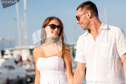 Image of smiling couple in city