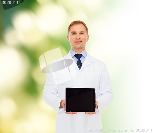 Image of smiling male doctor with tablet pc