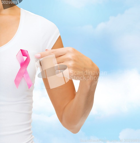 Image of close up of woman with cancer awareness ribbon