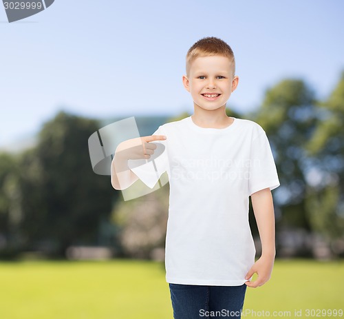 Image of smiling little boy in white blank t-shirt