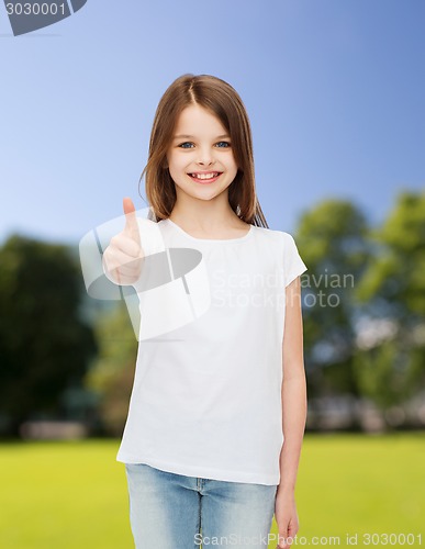 Image of smiling little girl in white blank t-shirt