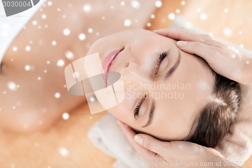 Image of beautiful young woman in spa