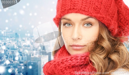 Image of close up of young woman in winter clothes