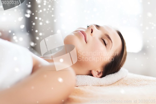 Image of beautiful young woman in spa