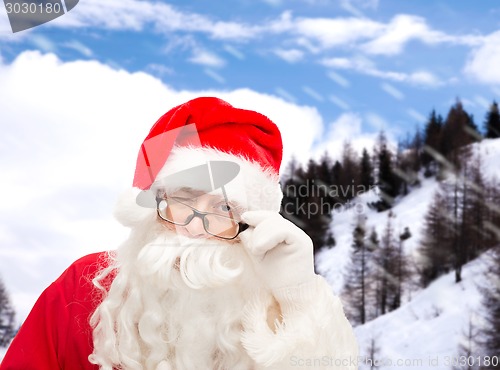 Image of close up of santa claus winking