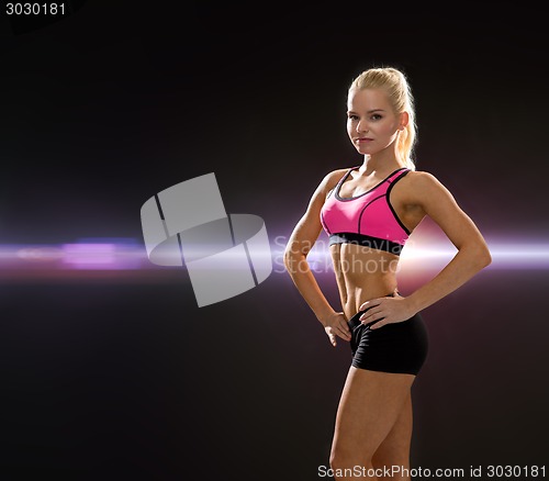 Image of beautiful athletic woman in sportswear