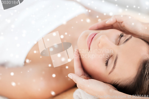 Image of beautiful young woman in spa