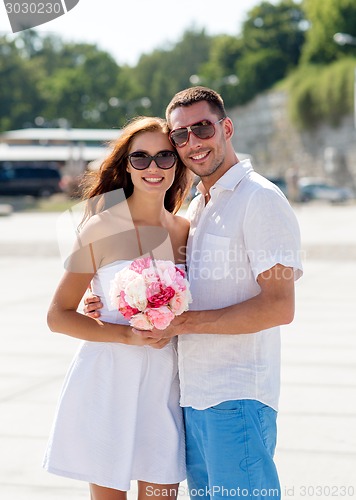 Image of smiling couple in city