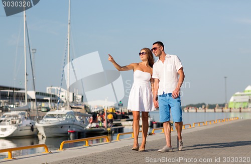 Image of smiling couple in city