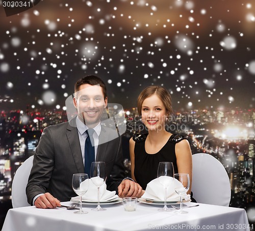 Image of smiling couple at restaurant