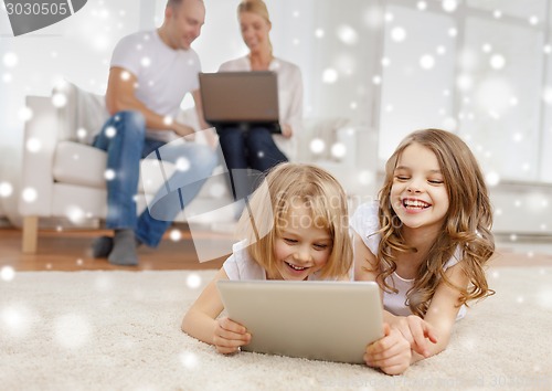 Image of happy family with tablet pc computers