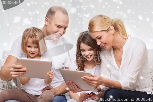 Image of happy family with tablet pc computers