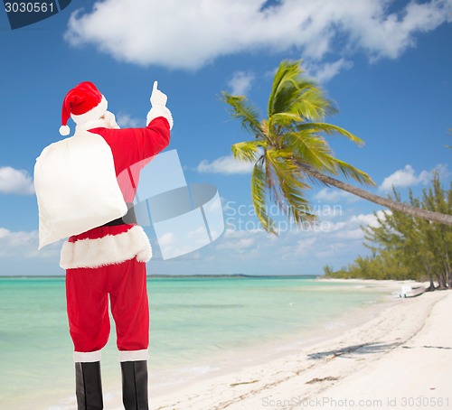Image of man in costume of santa claus with bag