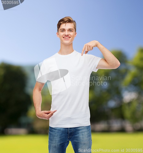 Image of smiling young man in blank white t-shirt