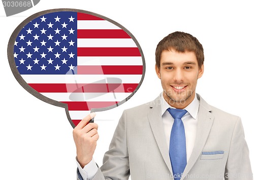 Image of smiling man with text bubble of american flag