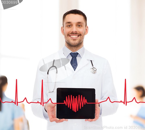 Image of smiling male doctor with tablet pc