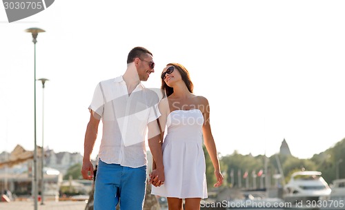 Image of smiling couple in city