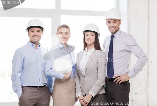 Image of happy business team in office