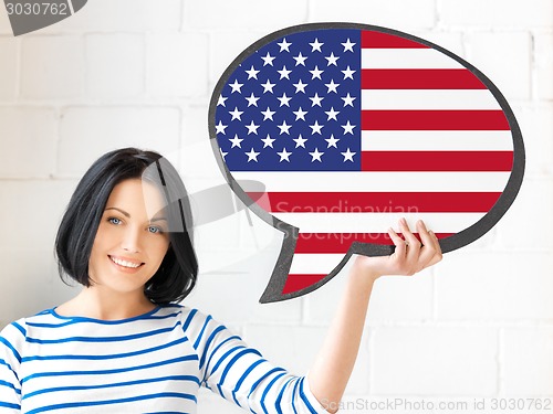 Image of smiling woman with text bubble of american flag