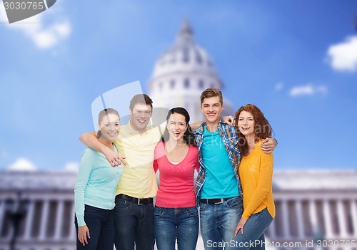 Image of group of smiling teenagers showing ok sign