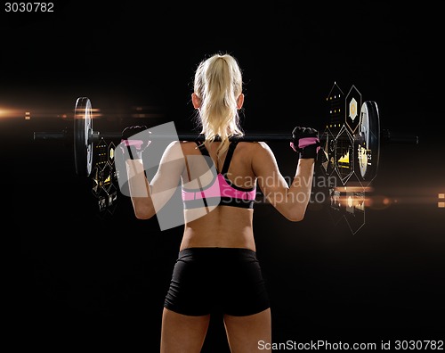 Image of sporty woman exercising with barbell from back