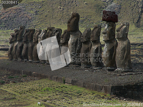 Image of Row Of Moai Against Mountain