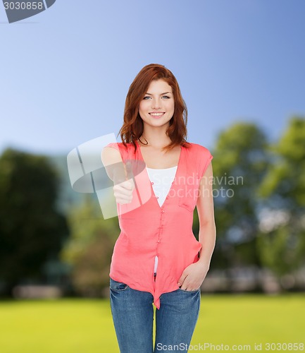 Image of smiling teenage girl in casual clothes