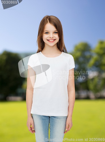 Image of smiling little girl in white blank t-shirt