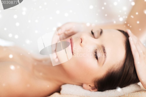 Image of beautiful young woman in spa