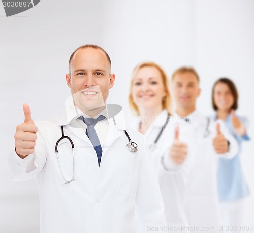 Image of smiling male doctor with stethoscope