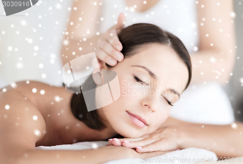 Image of beautiful young woman in spa