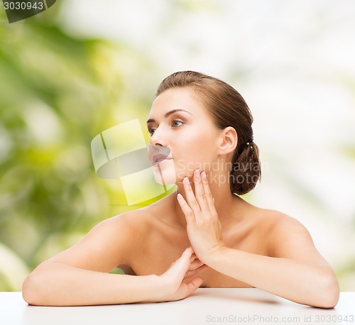 Image of smiling woman with clean perfect skin