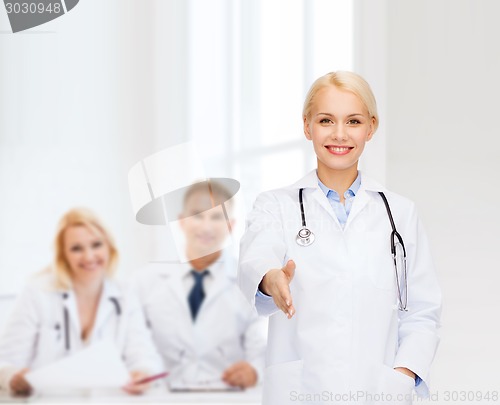 Image of smiling female doctor with stethoscope