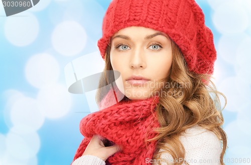 Image of close up of young woman in winter clothes