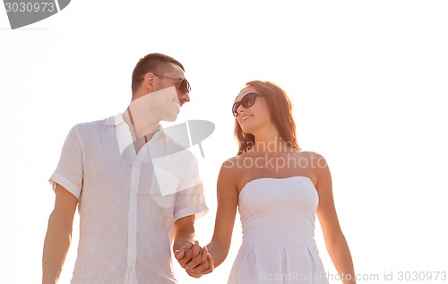 Image of smiling couple in city