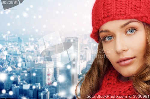 Image of close up of young woman in winter clothes