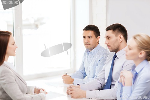 Image of businesswoman at interview in office