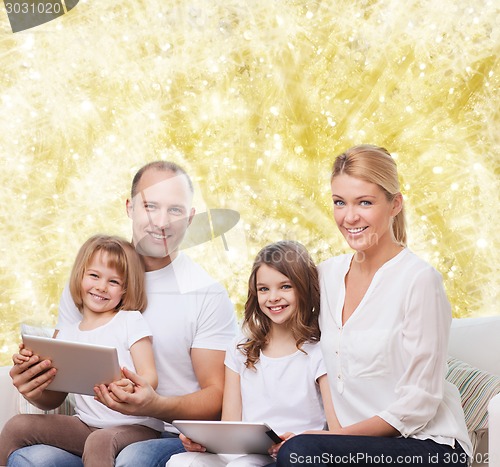 Image of happy family with tablet pc computers