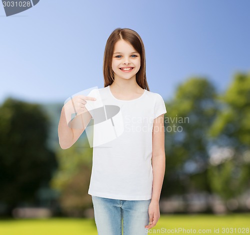 Image of smiling little girl in white blank t-shirt