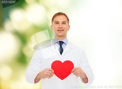 Image of smiling male doctor with red heart