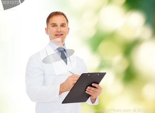 Image of smiling male doctor with clipboard