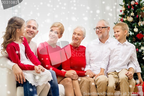 Image of smiling family at home