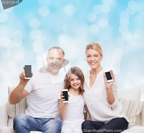 Image of happy family with smartphones