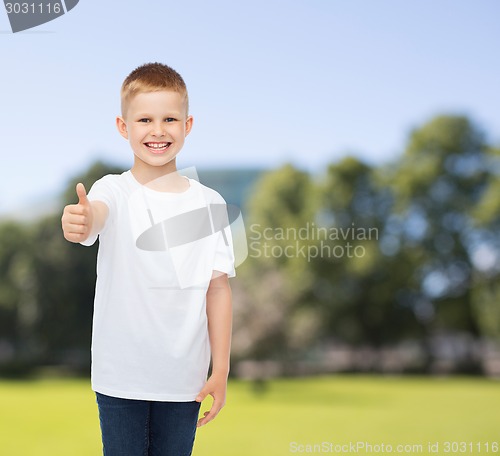 Image of smiling little boy in white blank t-shirt