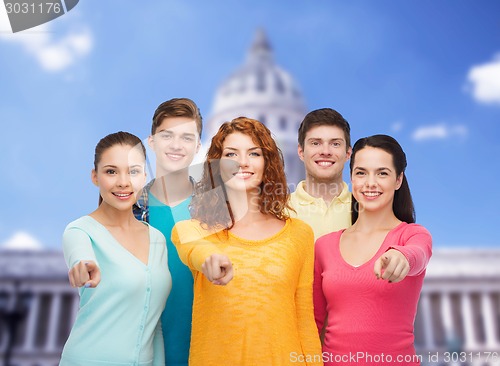 Image of group of smiling teenagers showing ok sign