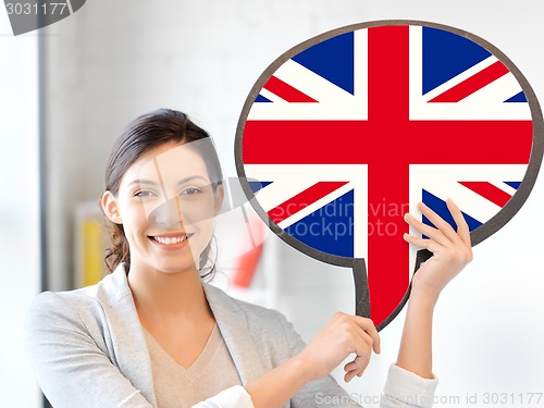 Image of smiling woman with text bubble of british flag