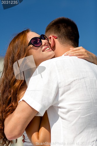 Image of smiling couple in city