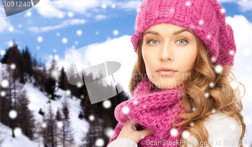 Image of close up of young woman in winter clothes
